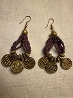 Front view of both earrings showing design, beads, coin charms