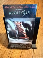 Front cover showing Apollo 13 artwork and main cast names