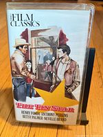 Front cover showing title, artwork and cast names