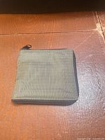 Front view of green fabric wallet