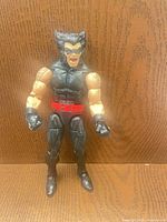 Front view of Wolverine Patch action figure standing