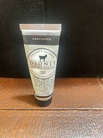 Front of Dionis Unscented Goat Milk Hand Cream tube