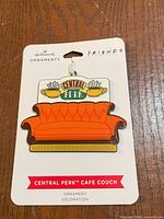 Hallmark Friends Central Perk Café Couch ornament on backing card