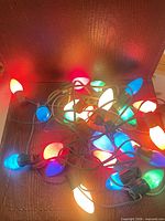 Lit multicolor C9 bulbs showing function