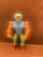 Front view of figure showing colour scheme and articulation