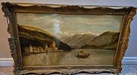 Front view of framed landscape painting