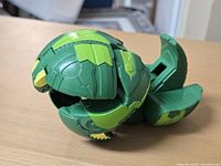 Bakugan Deka Ventus Mantonoid partially opened on tabletop