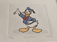 Close-up of Donald Duck etching showing numbering, signature, Disney copyright