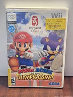 Front of Wii game case showing artwork and rating