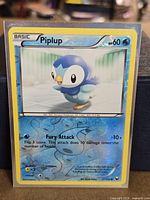 Front of Piplup Reverse Holo card in sleeve