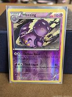 Front view of Weezing reverse holo card in sleeve