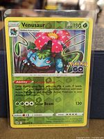 Front of Venusaur reverse holo card in sleeve