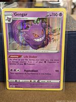 Front of Gengar holo card in sleeve