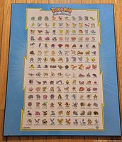 Front view of wood-mounted Pokémon 151 artwork plaque