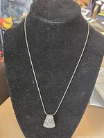 Full view of sterling silver necklace displayed on bust