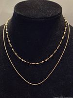 Front view of layered sterling necklace displayed on bust