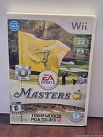 Front of Wii game case showing cover art, Masters flag, EA Sports logo