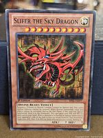 Front of Slifer the Sky Dragon card showing Mosaic Rare holo, code BP02-EN127