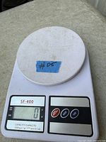 Top view of SF-400 digital kitchen scale with platform, display and buttons visible
