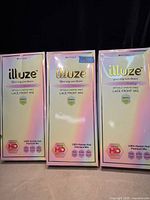 Front view of three Illuze boxes