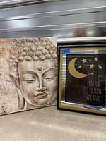 Buddha canvas and moon quote print side by side