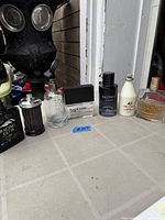 Group shot of all seven cologne and aftershave bottles