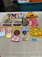 Full lot of assorted patches arranged on table