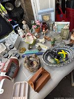 overall shot showing majority of curios on table