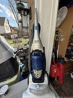 Full view of Shark Roadster upright vacuum standing upright