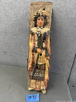 Front view showing Native American warrior figure and top incense hole