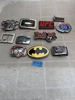 All nine buckles laid out