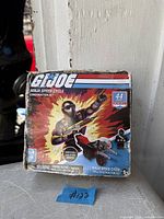 Front of worn G.I. Joe Ninja Speed Cycle box showing 44-piece count and artwork