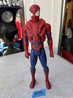 Front view of Spider-Man Mech Strike Monster Hunters action figure standing upright