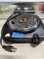 Top view showing entire hot plate, cord, dial, indicator lights