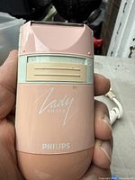 Front view of Philips Lady Shave shaver showing branding and foil head