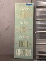 Full view of vinyl wall art showing text and color