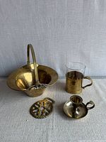 Group view of all four brass items