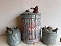 Group shot of all three galvanized fuel cans showing sizes and condition