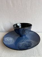 Plate and bowl together displaying glaze pattern