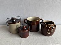 Front view of all stoneware pieces showing form, color and relative sizes