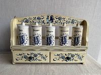 Full view of rack with five jars in place