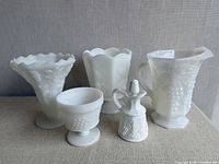 Group shot showing all five milk glass grape pattern pieces