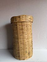 full view of cylindrical wicker basket
