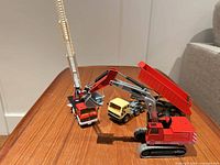 All four Siku diecast vehicles grouped