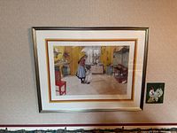 Full view of framed print on wall