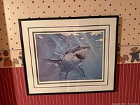 Full view of framed print on wall