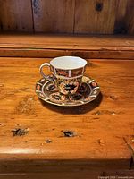 Cup on saucer front view showing pattern