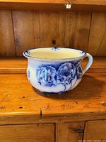 Right side view showing Norbury flow blue floral decoration and handle