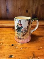 Front view showing archer scene and overall design