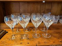 Front angled view showing all 8 Atlantis Chartres wine glasses